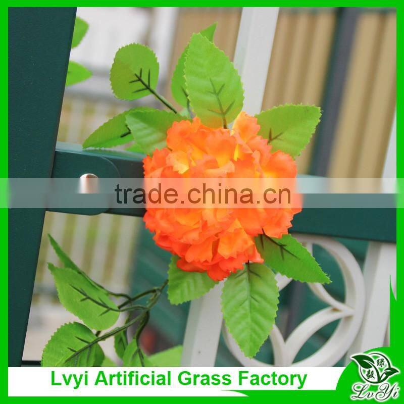 Artificial green leaf vine with flowers for decoration