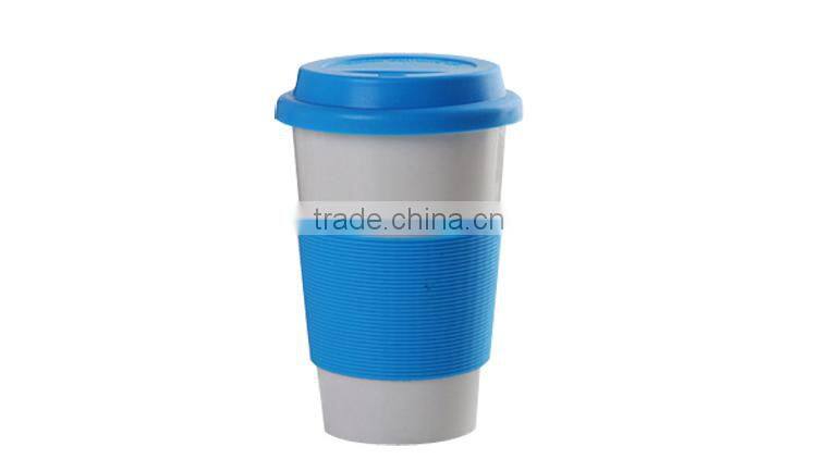 Wholesale porcelain promotional coffee mug white ceramic mug with silicone lid and sleeve