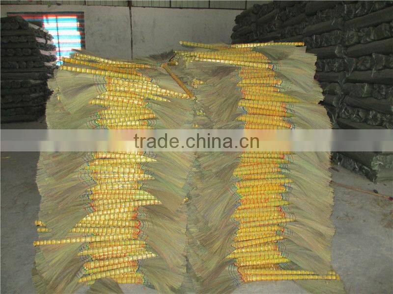 grass broom with short wooden handle