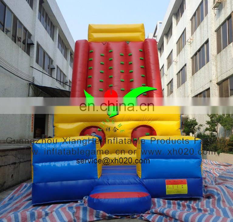 Inflatable climbing wall with obstacle course