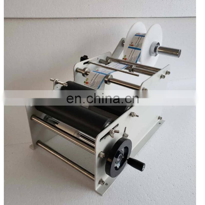 YTK-L100 handheld hand held manual round bottle labeling machine for bottle used,manual round bottle labeler