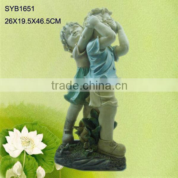 Hand carved outdoor children garden statue for sale.