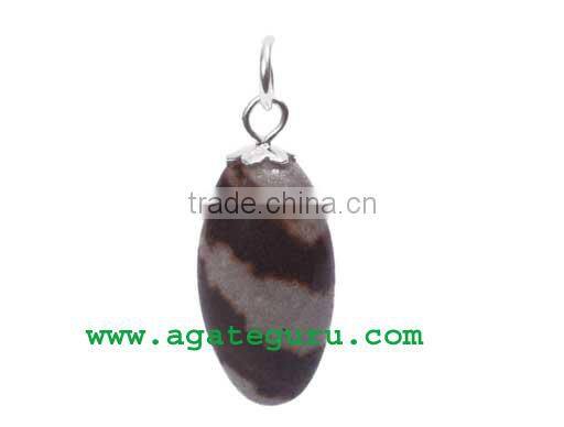 Narmada Shiva Lingam with Black Stone Base : Wholesale Gemstone Narmada Shiva Lingam