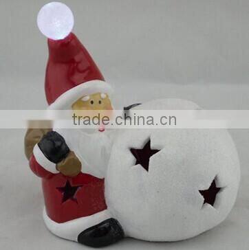 Polyresin Christmas Santa Claus doll figurines with hollow snowball craft decoration