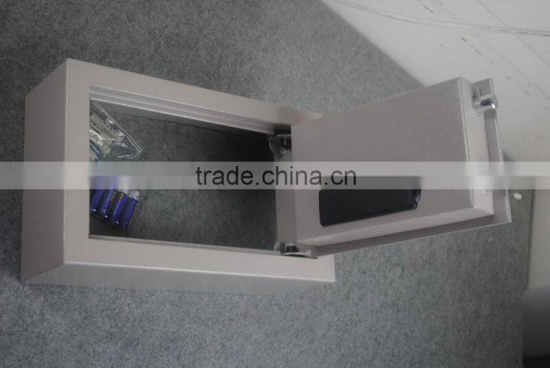 Small open top safe box with a handle into a drawer