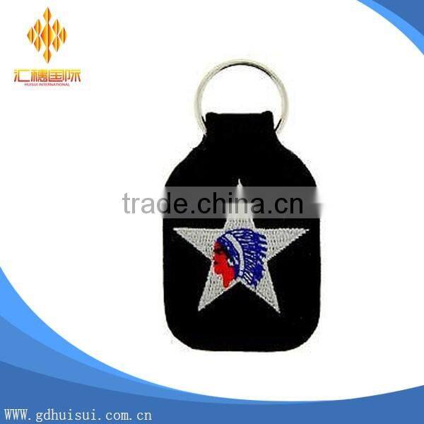 Popular design cheap customized elliptical shape embroidery personalized logo key chain