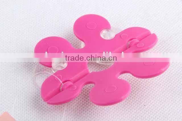 Flower shaped with two suckers folding toothbrush holder