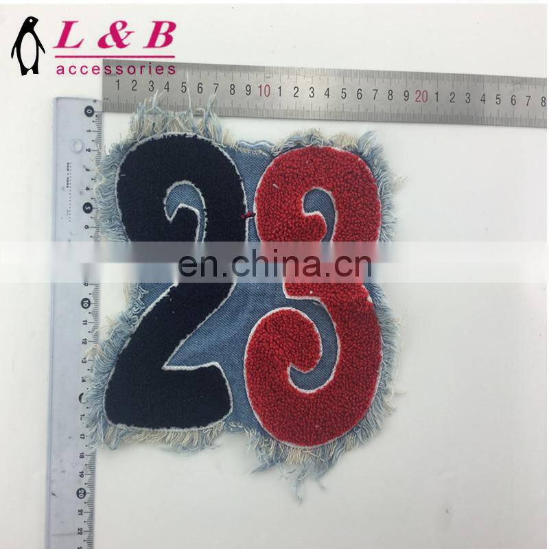 New design wholesale towel embroidery patch with denim
