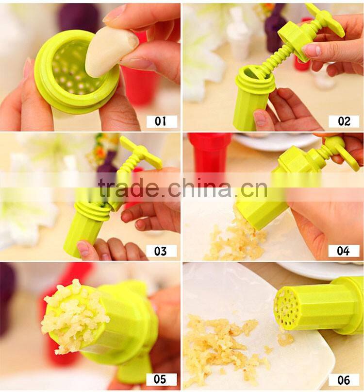 Garlic Press Peeler Crusher Presser Twist Kitchen Helper Gadget Cutter Hand Tool