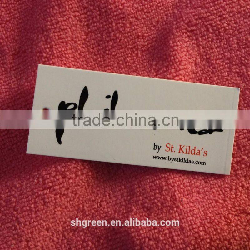 Glossy hole punched paper swing tags