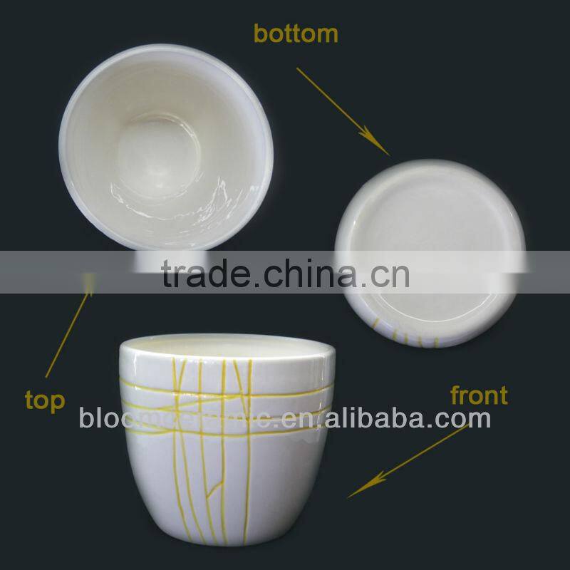 White ceramic cylinder pot