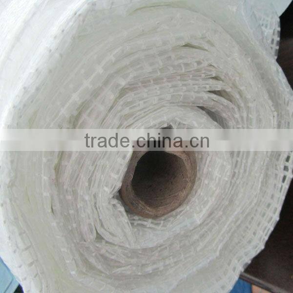 Strong clear or green mesh tarpaulin sheet used for building trade