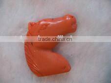 wholesale 20-35mm orange horse head carved natural coral pendant