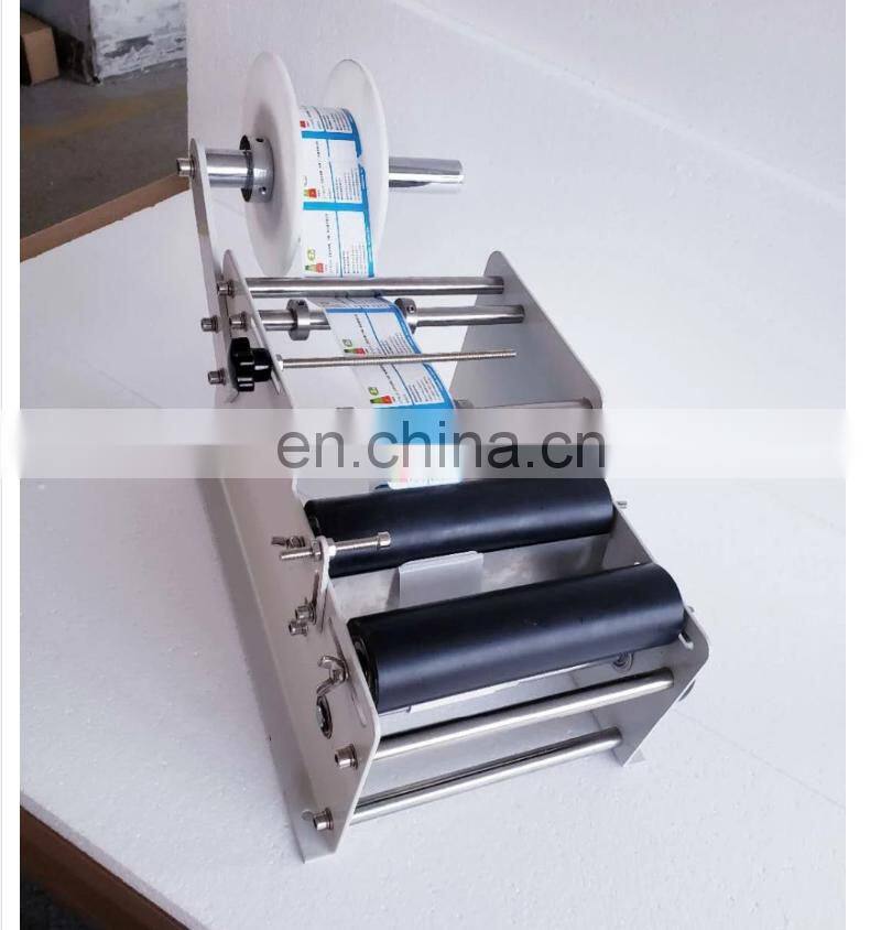 YTK-L100 handheld hand held manual round bottle labeling machine for bottle used,manual round bottle labeler