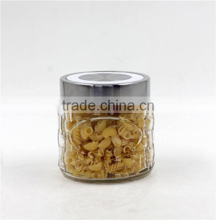 clear glass canister with silver lid