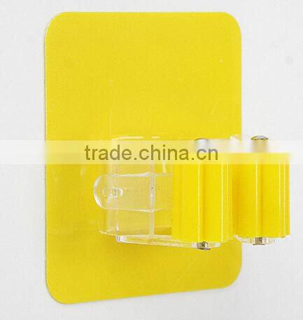Wholesale Stock Magic Wall Suction Plastic Mop Handle Storage Holder