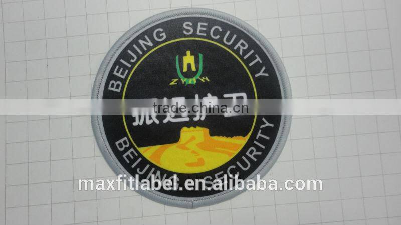 The best selling machine cheap woven patch for garment clothes in Qingdao
