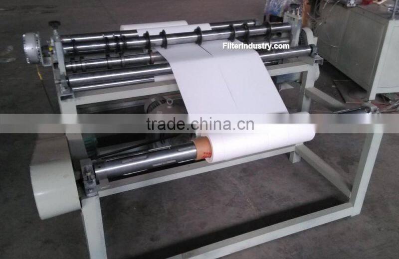 Auto filter paper slitting and rewinding machine