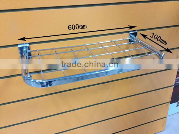 Retail metal grid panel clothing display shelf