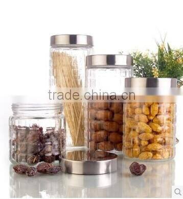 clear cylinder glass storage jar with air bubbles and stainless steel lid