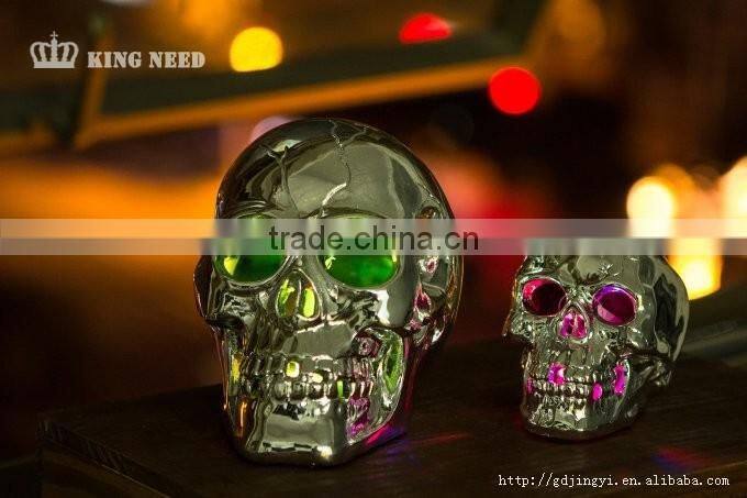 Silver plastic halloween skull head with LED light