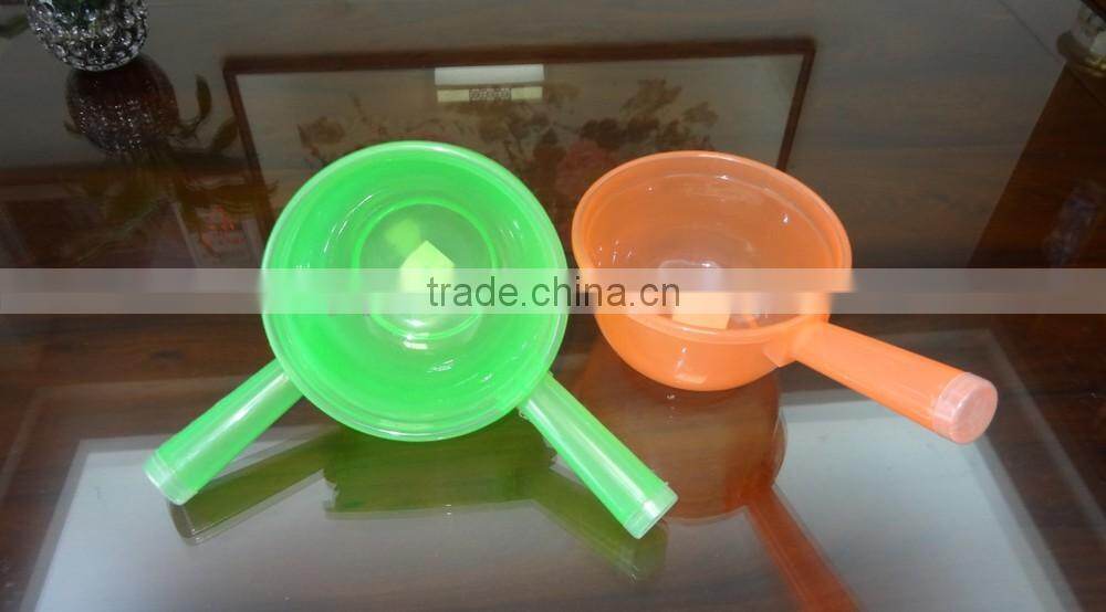 Clear plastic water ladle and soup ladle