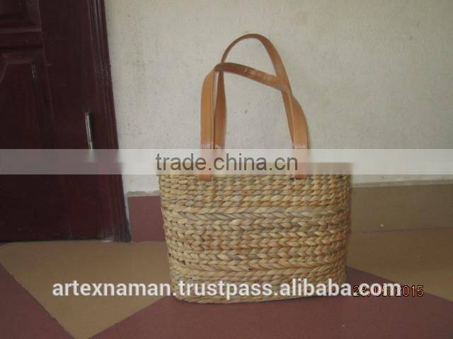 Eco-friendly water hyacinth handbag with handles, fashionable looking, good price, natural material from Vietnam