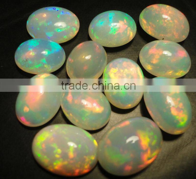 Natural Ethiopian Fire Opal oval cabochon cut beads