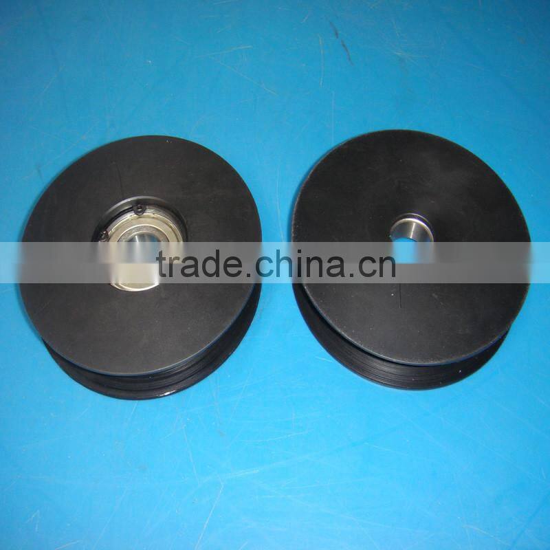 CNC machining black Nylon polyamide PA6 pulley wheels with bearings