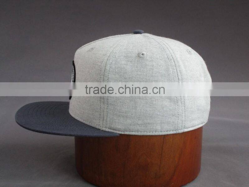 Custom 100% cotton 6-panel snapback cap with front woven label