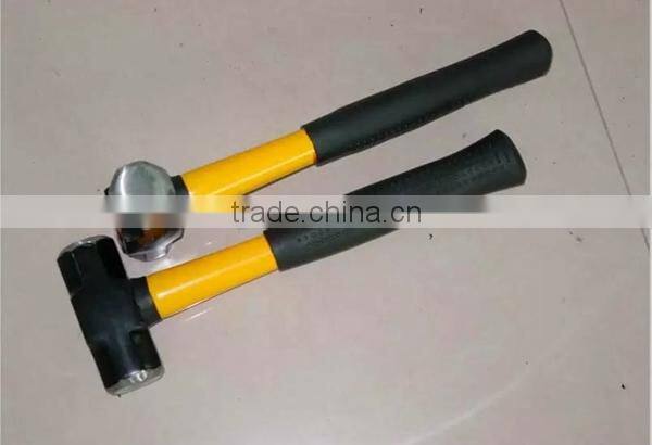 1 lb drop forged head sledge hammer with fiberglass handle.