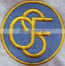 simple design round shape 100% custom embroidery patches from China factory