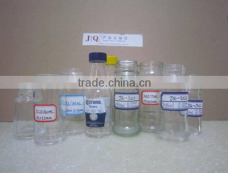 clear glass spice jar and salt shaker