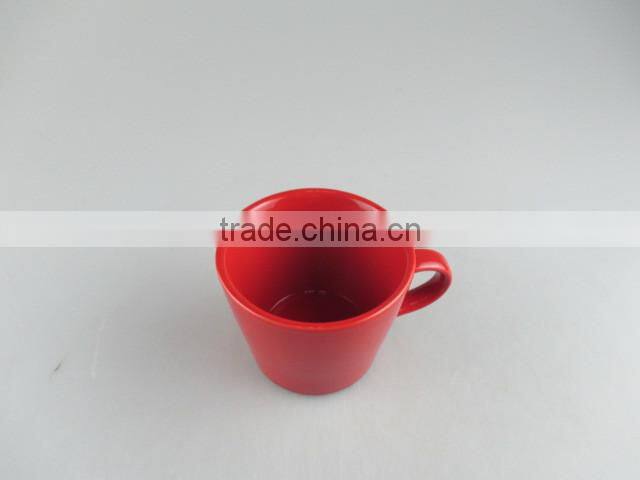 round ceramic red-glazed coffee cup
