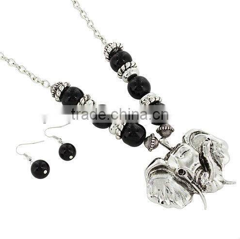 24" Red Beaded Silvertone Elephant Necklace and Earring Set