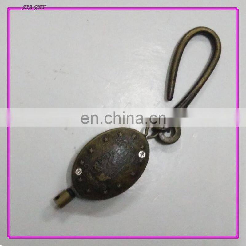 Plastic badge reel retractor