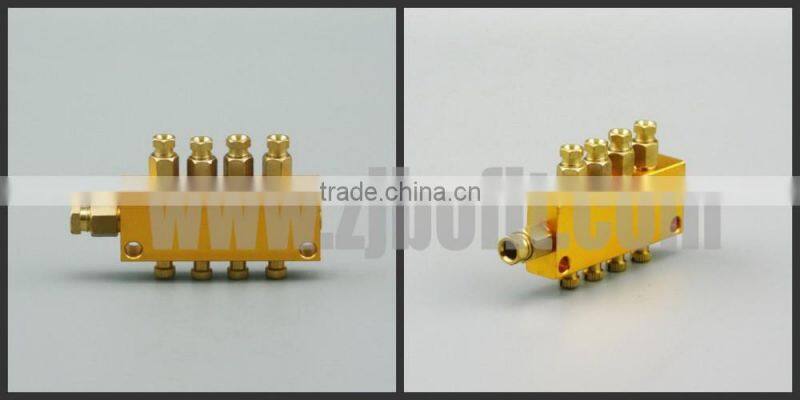 Multi-hole oil distributor for machine use