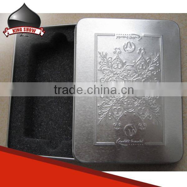 paper and plastic tarot cards packed into tin box for game