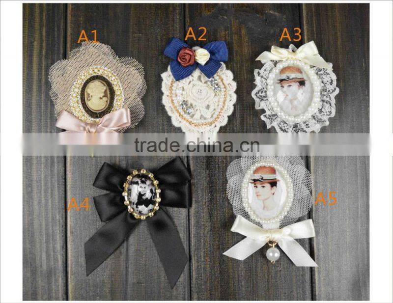 2015 fashion white pearl and fabric brooch