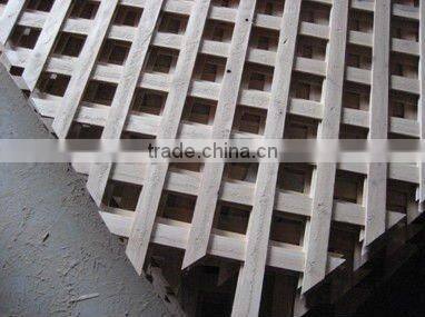 Solid wood lattice panels used as garden door