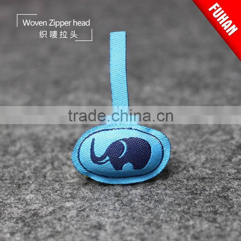 Double-sided woven zipper puller