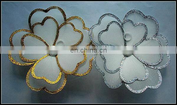 White lace flower with gold or silver glitter