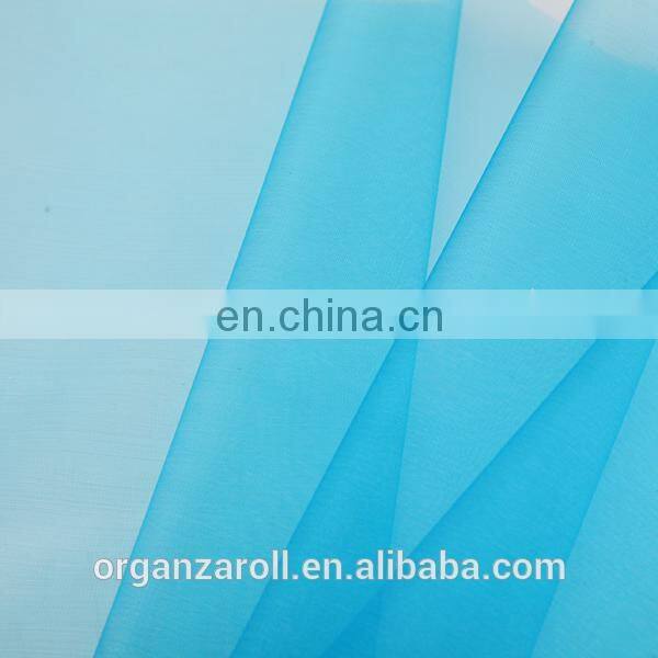 2015 hot sale customized cheap polyester crystal organza fabric roll
