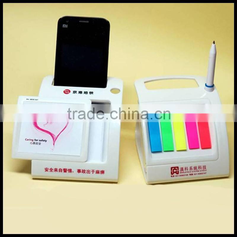 Flexible use memo note pads with pen hole and slot and multicolored strips stick