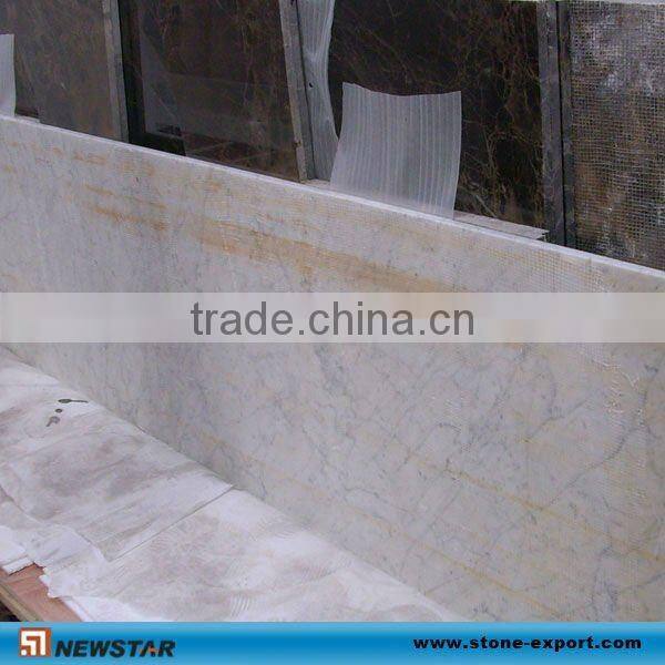 white marble stairs railing