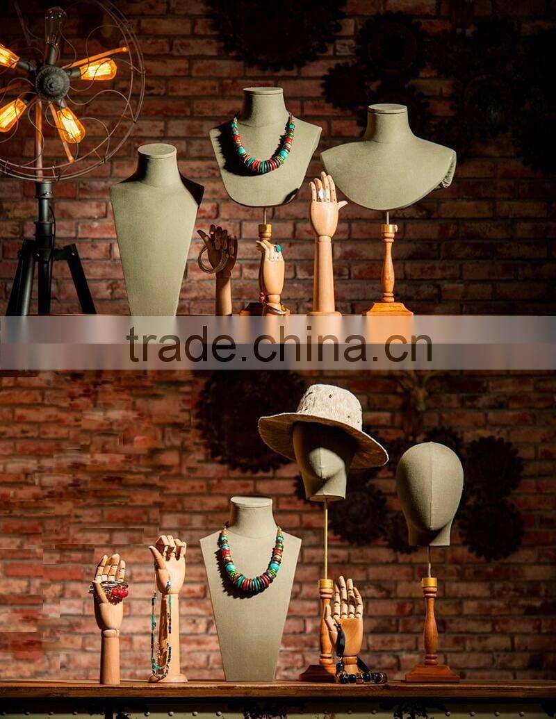 25cm height female left wooden hand beech wood with round wooden base an articulated hand