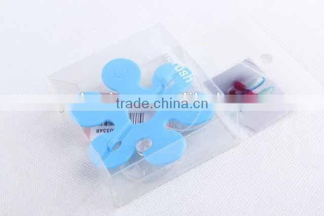 Flower shaped with two suckers folding toothbrush holder