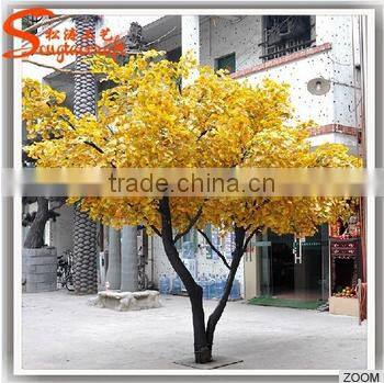 Decorative large artificial tree branches and leaves