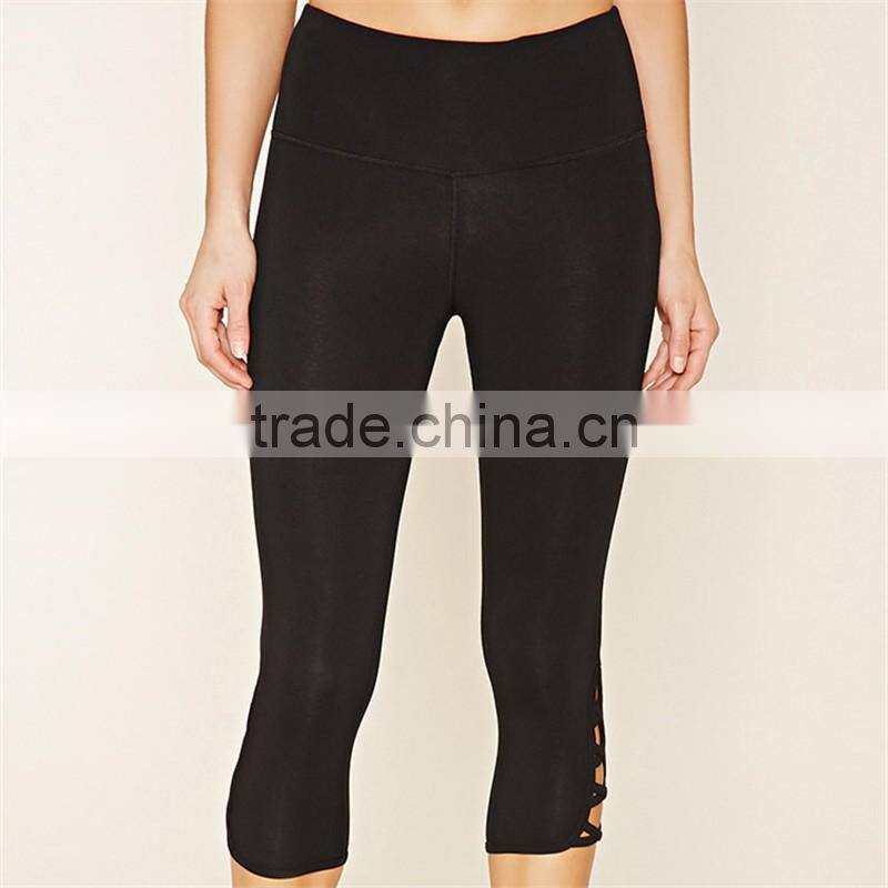 China Hot Sale Crisscross Capri Leggings Saxi Girl Cotton Yoga Pants