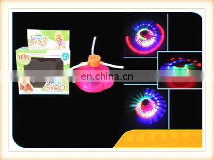 New product Plastic kids Christmas toy infrared ray musical spinning flashing top toy